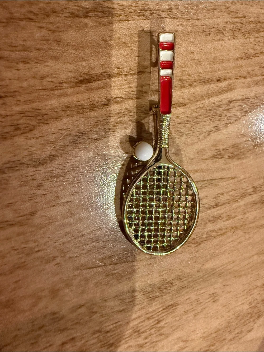 Gold Tennis Racket Brooch with Red and White Handle